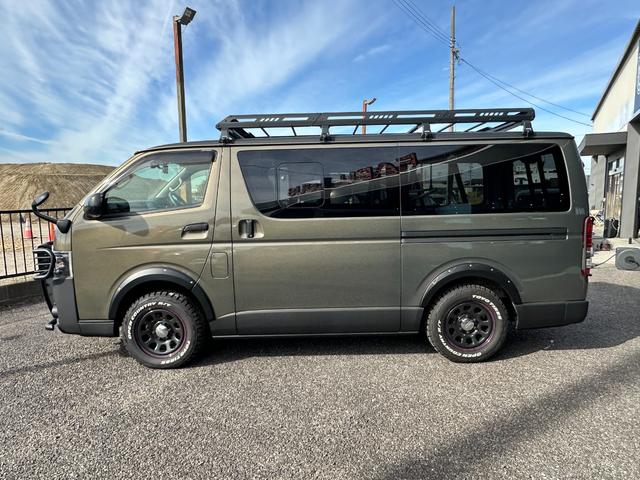 ハイエースバン ロングDX GLパッケージ 9人乗り 4WD ディーゼル リアクーラー&ヒーター ブロンズメタリック&マットブラック塗装 ベッドキット 社外タイヤ/アルミ/バンパーガード/キャリア/ラダー/テールガード/LEDヘッドライト(6枚目)