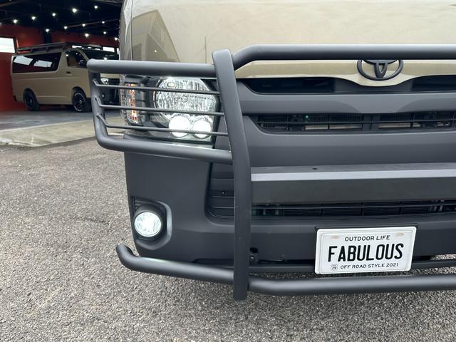 ハイエースバン ロングDX GLパッケージ 9人乗り 4WD ディーゼル リアクーラー&ヒーター ブロンズメタリック&マットブラック塗装 ベッドキット 社外タイヤ/アルミ/バンパーガード/キャリア/ラダー/テールガード/LEDヘッドライト(12枚目)