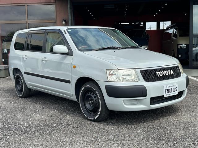 サクシードバン UL Xパッケージ 4WD グレー&マットブラック塗装 ホワイトレタータイヤ ウッド調ハンドル シートカバー 電動格納ドアミラー ナビ Bluetooth バックカメラ TV ETC(5枚目)