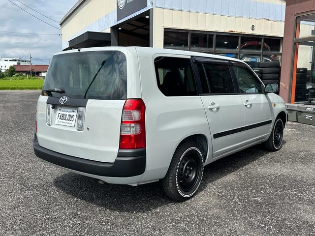 サクシードバン UL Xパッケージ 4WD グレー&マットブラック塗装 ホワイトレタータイヤ ウッド調ハンドル シートカバー 電動格納ドアミラー ナビ Bluetooth バックカメラ TV ETC(7枚目)