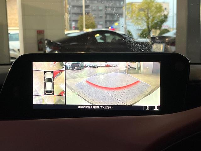 MAZDA3ファストバック 20Sバーガンディ セレクション 360度セーフティパッケージ レッドパーフォレーション革シート スマートブレーキサポート レーダークルーズコントロール ブラインドスポットモニタリング 純正18インチアルミ シートヒーター 純正ナビ(3枚目)