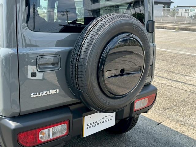 ジムニー XC 4WD オートマチック 純正16インチアルミホイール LEDヘッドライト フロントフォグランプ 運転席/助手席シートヒーター スマートキー プッシュボタンスタート 背面スペアタイヤ 電動格納ドアミラー(25枚目)