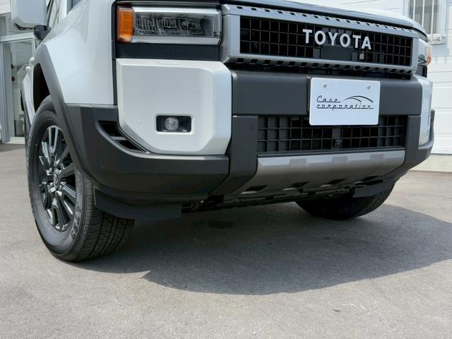 ランドクルーザー250 VX サンルーフ JBLサウンドシステム トヨタチームメイト デジタルインナーミラー パノラミックビューモニター 7人乗り 黒革シート レーダークルーズコントロール BSM 18インチAW  シートヒーター(12枚目)