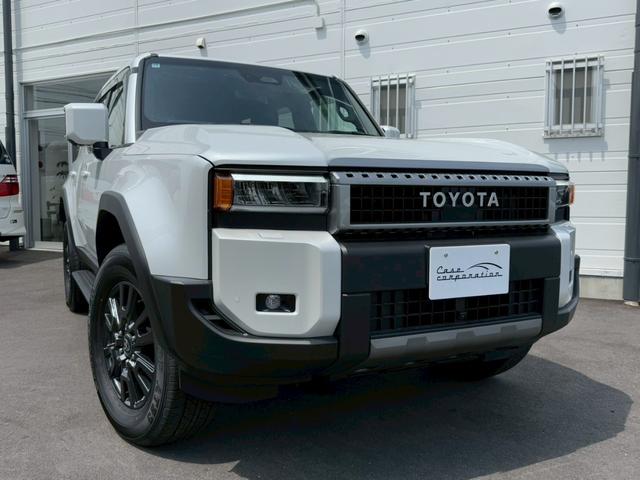 ランドクルーザー２５０ ＶＸ　サンルーフ　ＪＢＬサウンドシステム　トヨタチームメイト　デジタルインナーミラー　パノラミックビューモニター　７人乗り　黒革シート　レーダークルーズコントロール　ＢＳＭ　１８インチＡＷ　　シートヒーター（11枚目）