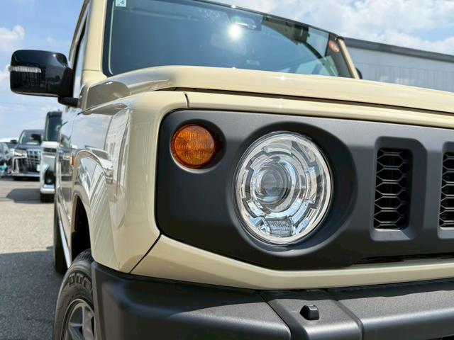 ジムニー ＸＣ　スズキセーフティーサポート　運転席助手席シートヒーター　ＬＥＤヘッドライト　クルーズコントロール　ステアリングスイッチ　スマートキー　プッシュボタンスタート　背面スペアタイヤ　電動ミラー　オートライト（19枚目）