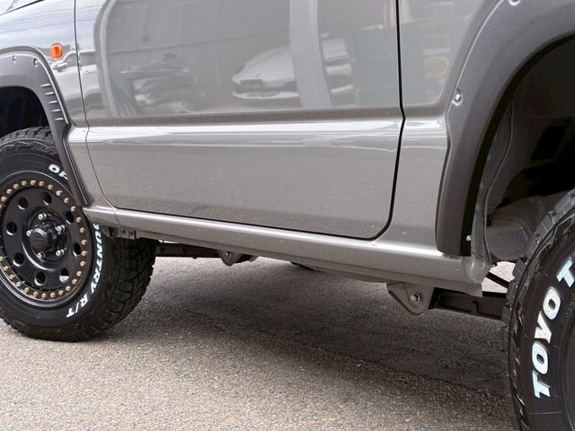 ジムニー XC 10インチフローティングマルチオーディオ 黒レザーシートカバー 1.5インチリフトアップ グリルガード LEDフォグライト リアダラー オーバーフェンダー 16インチAW ルーフラック シートヒーター(34枚目)