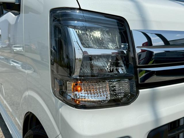 エブリイワゴン PZターボスペシャル ハイルーフ 届出済未使用車 ディスプレイオーディオ バックカメラ 両側電動スライドドア シートヒーター 片側電動ステップ LEDヘッドライト 車線逸脱警報 衝突被害軽減システム 純正14インチアルミ(14枚目)