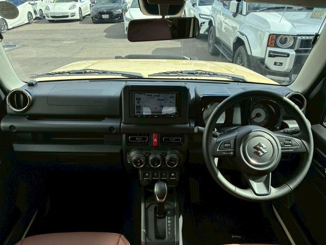 ジムニー XC 社外ナビ フルセグTV バックカメラ リフトアップ オーバーフェンダー ブラウンレザーシートカバー 16インチアルミホイール オープンカントリータイヤ 大型グリルガード リアラダー スペアタイヤカバー(2枚目)