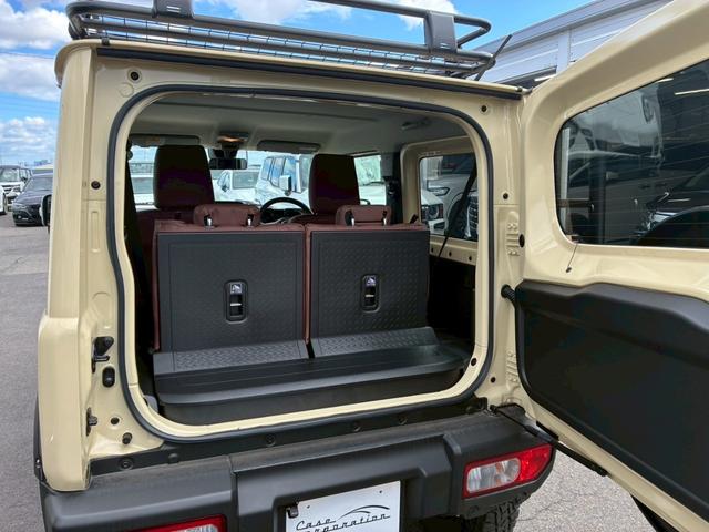 ジムニー XC 社外ナビ フルセグTV バックカメラ リフトアップ オーバーフェンダー ブラウンレザーシートカバー 16インチアルミホイール オープンカントリータイヤ 大型グリルガード リアラダー スペアタイヤカバー(67枚目)