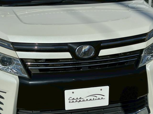 ヴォクシー ZS 煌 アルパイン10インチナビ 天井モニター HDMI入力 LEDヘッドライト 7人乗 両側電動スライドドア バックカメラ 社外18インチAW 後席オートエアコン スペアタイヤ 寒冷地仕様 スマートキー(12枚目)