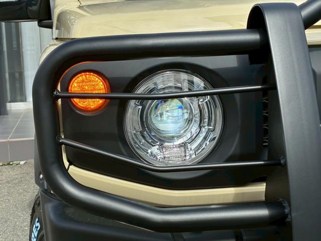 ジムニー ＸＣ　社外ナビ　フルセグＴＶ　バックカメラ　リフトアップ　オーバーフェンダー　ブラウンレザーシートカバー　１６インチアルミホイール　オープンカントリータイヤ　大型グリルガード　リアラダー　スペアタイヤカバー（14枚目）