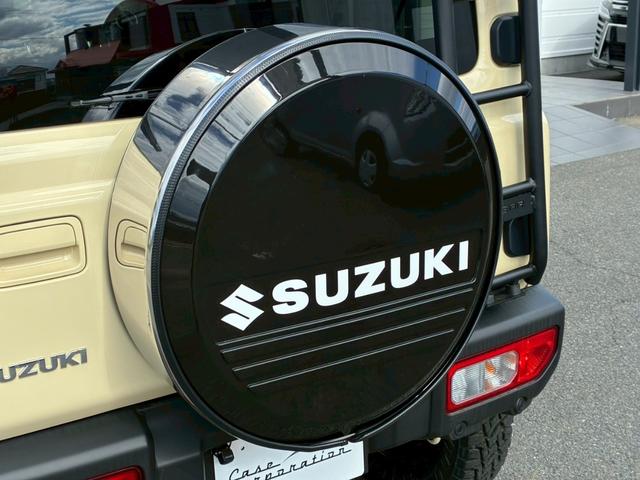 ジムニー ＸＣ　社外ナビ　フルセグＴＶ　バックカメラ　リフトアップ　オーバーフェンダー　ブラウンレザーシートカバー　１６インチアルミホイール　オープンカントリータイヤ　大型グリルガード　リアラダー　スペアタイヤカバー（28枚目）