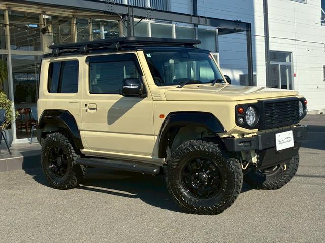 ジムニー XC 10インチディスプレイオーディオ オーバーフェンダー サイドステップ リフトアップ 15インチAW ジオランダータイヤ ディフェンダーグリル 黒レザーシートカバー リアラダー ショートバンパー(9枚目)