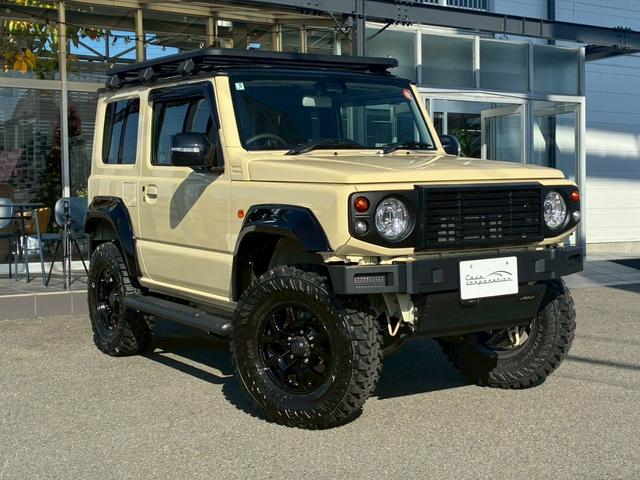 ジムニー XC 10インチディスプレイオーディオ オーバーフェンダー サイドステップ リフトアップ 15インチAW ジオランダータイヤ ディフェンダーグリル 黒レザーシートカバー リアラダー ショートバンパー(10枚目)