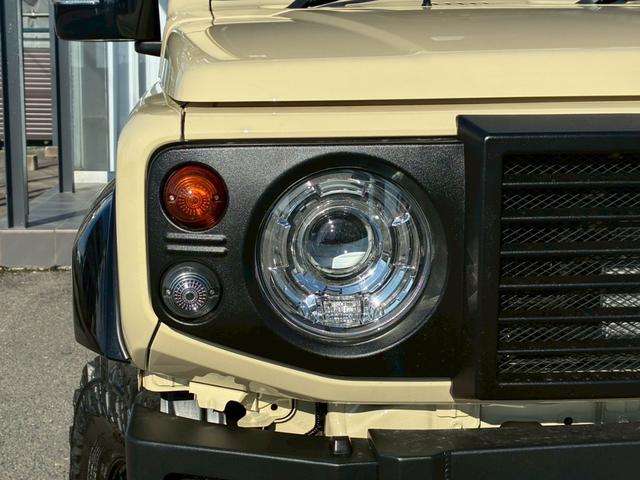 ジムニー XC 10インチディスプレイオーディオ オーバーフェンダー サイドステップ リフトアップ 15インチAW ジオランダータイヤ ディフェンダーグリル 黒レザーシートカバー リアラダー ショートバンパー(15枚目)