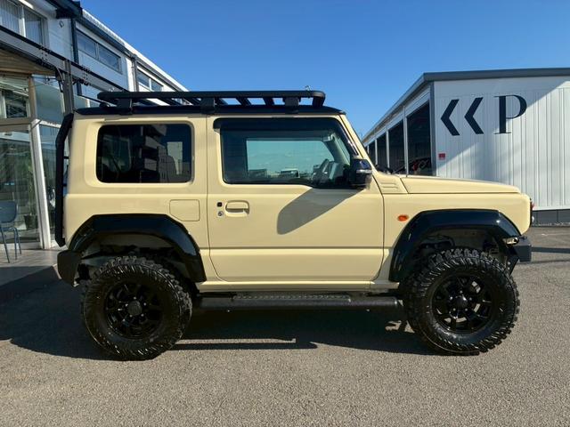 ジムニー XC 10インチディスプレイオーディオ オーバーフェンダー サイドステップ リフトアップ 15インチAW ジオランダータイヤ ディフェンダーグリル 黒レザーシートカバー リアラダー ショートバンパー(22枚目)