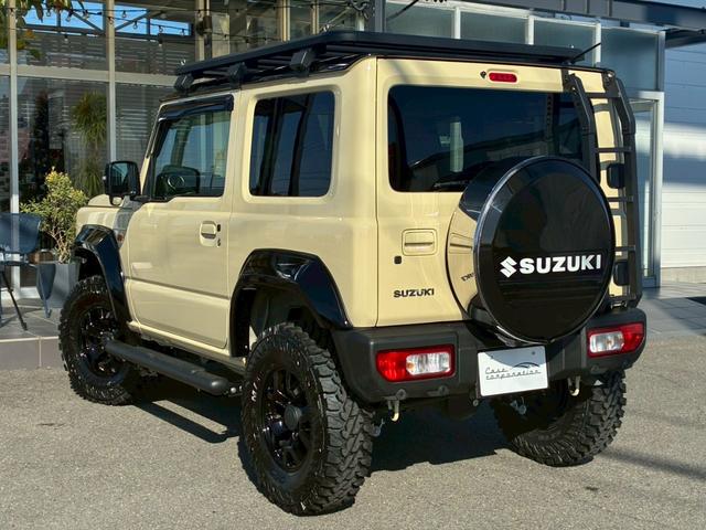 ジムニー XC 10インチディスプレイオーディオ オーバーフェンダー サイドステップ リフトアップ 15インチAW ジオランダータイヤ ディフェンダーグリル 黒レザーシートカバー リアラダー ショートバンパー(26枚目)