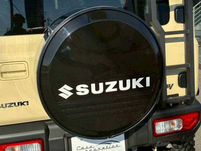 ジムニー XC 10インチディスプレイオーディオ オーバーフェンダー サイドステップ リフトアップ 15インチAW ジオランダータイヤ ディフェンダーグリル 黒レザーシートカバー リアラダー ショートバンパー(28枚目)