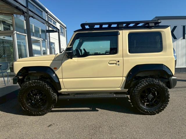 ジムニー XC 10インチディスプレイオーディオ オーバーフェンダー サイドステップ リフトアップ 15インチAW ジオランダータイヤ ディフェンダーグリル 黒レザーシートカバー リアラダー ショートバンパー(36枚目)