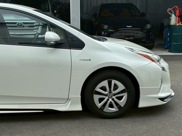 プリウス Ａ　９インチナビ　モデリスタエアロ（Ｆ．Ｓ．Ｒ）　寒冷地仕様ヘッドアップディスプレイ　ブラインドスポットモニター　クリアランスソナー　バックカメラ　　ＬＤＡ　ＰＣＳ　　リアフォグランプ　純正１５インチＡＷ（23枚目）