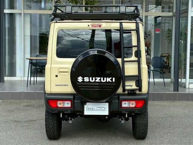 ジムニー XC 社外ナビ フルセグTV バックカメラ リフトアップ オーバーフェンダー ブラウンレザーシートカバー 16インチアルミホイール オープンカントリータイヤ 大型グリルガード リアラダー スペアタイヤカバー(8枚目)