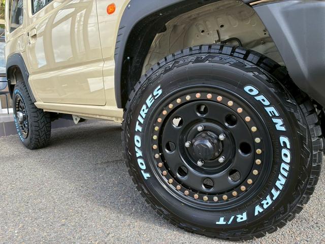 ジムニー XC 社外ナビ フルセグTV バックカメラ リフトアップ オーバーフェンダー ブラウンレザーシートカバー 16インチアルミホイール オープンカントリータイヤ 大型グリルガード リアラダー スペアタイヤカバー(16枚目)