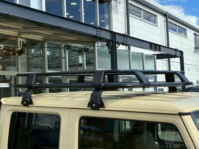 ジムニー XC 社外ナビ フルセグTV バックカメラ リフトアップ オーバーフェンダー ブラウンレザーシートカバー 16インチアルミホイール オープンカントリータイヤ 大型グリルガード リアラダー スペアタイヤカバー(21枚目)