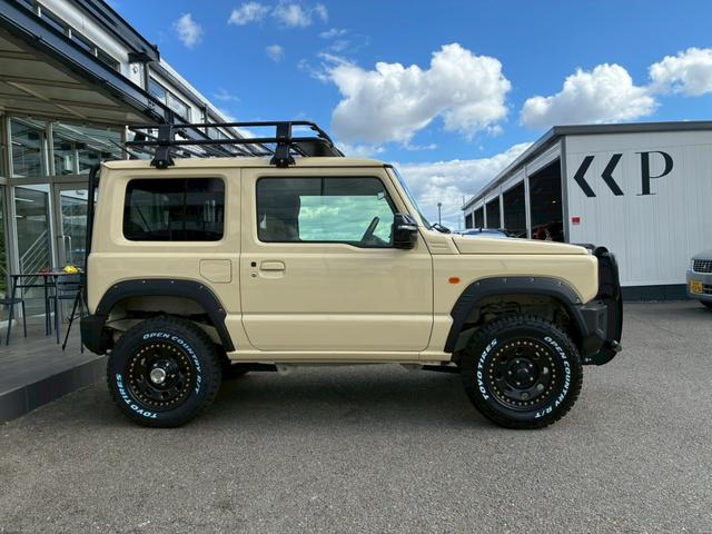 ジムニー XC 社外ナビ フルセグTV バックカメラ リフトアップ オーバーフェンダー ブラウンレザーシートカバー 16インチアルミホイール オープンカントリータイヤ 大型グリルガード リアラダー スペアタイヤカバー(22枚目)