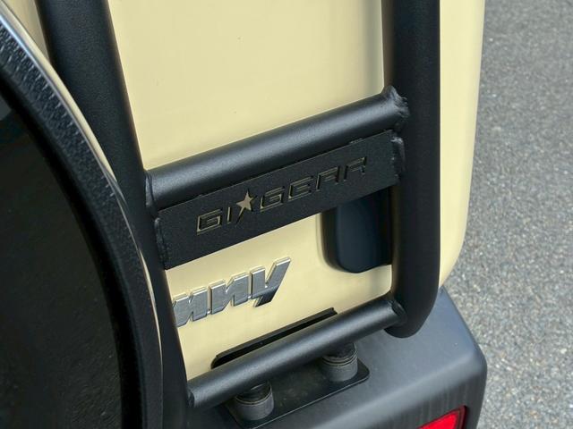 ジムニー XC 社外ナビ フルセグTV バックカメラ リフトアップ オーバーフェンダー ブラウンレザーシートカバー 16インチアルミホイール オープンカントリータイヤ 大型グリルガード リアラダー スペアタイヤカバー(29枚目)