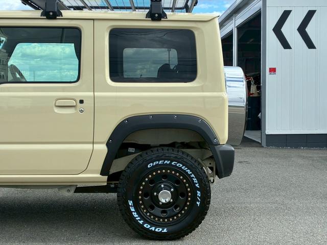 ジムニー XC 社外ナビ フルセグTV バックカメラ リフトアップ オーバーフェンダー ブラウンレザーシートカバー 16インチアルミホイール オープンカントリータイヤ 大型グリルガード リアラダー スペアタイヤカバー(36枚目)