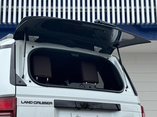 ランドクルーザー250 ZXファーストエディション 内装ブラウン ディーゼルターボ 丸目ヘッドランプ 12.3型JBLコネクトナビ ヘッドアップディスプレイ シートヒーター&ベンチレーション 電動ルーフ 電動格納サードシート シートメモリ 置くだけ充電(28枚目)