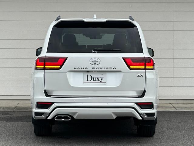 ランドクルーザー ZX モデリスタエアロ+リヤスポイラー 12.3型JBLコネクトナビ リヤエンター クールBOX 電動リヤデフロック 12.3TFTカラーメーター ブラックルーフレール 電動格納式サードシート 純正18AW(7枚目)