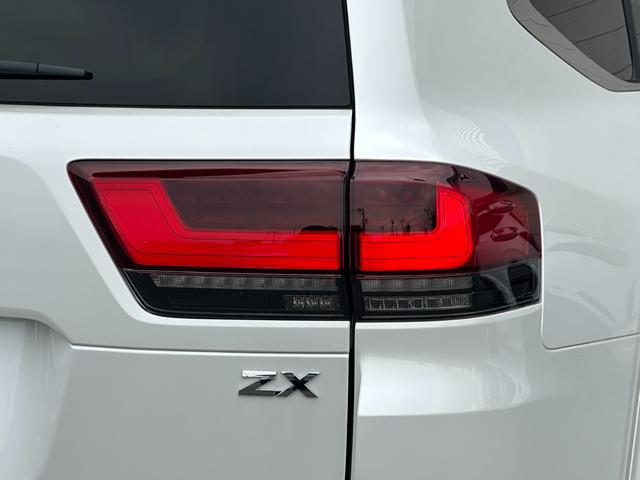 ランドクルーザー ZX モデリスタエアロ+リヤスポイラー 12.3型JBLコネクトナビ リヤエンター クールBOX 電動リヤデフロック 12.3TFTカラーメーター ブラックルーフレール 電動格納式サードシート 純正18AW(26枚目)