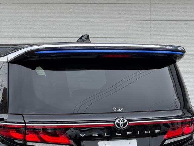 ヴェルファイアハイブリッド エグゼクティブラウンジ　内装ブラウン　モデリスタエアロ　シグネチャーイルミ　イルミルーフスポイラー　１４型ＪＢＬコネクトナビ　１４型リヤエンター　ユニバーサルステップ　デジタルミラー　ムーンルーフ　ＣＤ／ＤＶＤ　純正１９ＡＷ（27枚目）