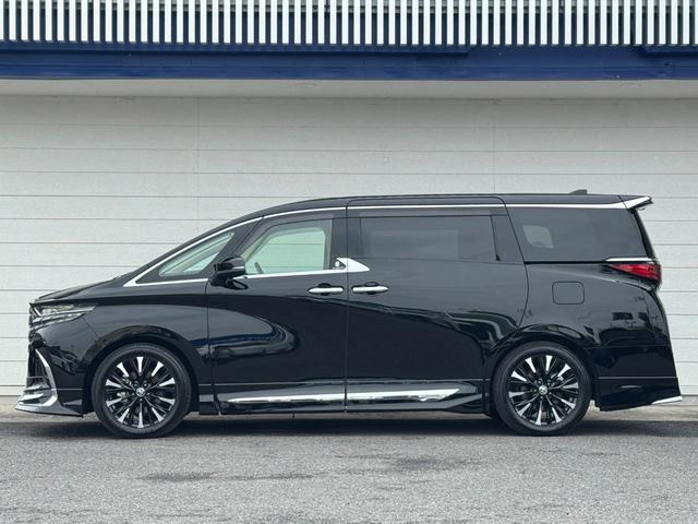 アルファードハイブリッド エグゼクティブラウンジ 内装ニュートラルベージュ 14型コネクトナビ JBLプレミアムサウンド リヤエンターテイメント デジタルミラー 左右独立ムーンルーフ CD/DVDデッキ スペアタイヤ 置くだけ充電 純正19インチAW(8枚目)