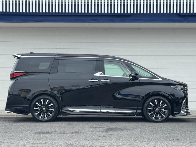 アルファードハイブリッド エグゼクティブラウンジ 内装ニュートラルベージュ 14型コネクトナビ JBLプレミアムサウンド リヤエンターテイメント デジタルミラー 左右独立ムーンルーフ CD/DVDデッキ スペアタイヤ 置くだけ充電 純正19インチAW(9枚目)