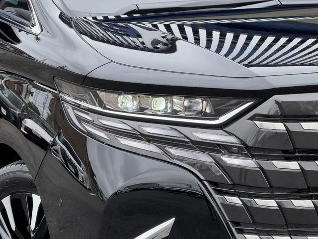 アルファードハイブリッド エグゼクティブラウンジ 内装ニュートラルベージュ 14型コネクトナビ JBLプレミアムサウンド リヤエンターテイメント デジタルミラー 左右独立ムーンルーフ CD/DVDデッキ スペアタイヤ 置くだけ充電 純正19インチAW(15枚目)