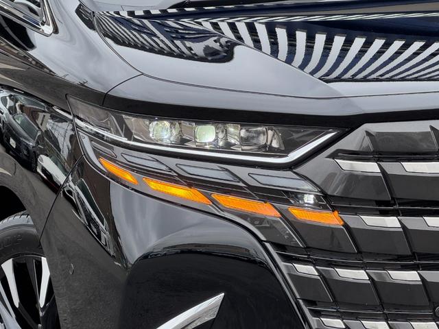 アルファードハイブリッド エグゼクティブラウンジ 内装ニュートラルベージュ 14型コネクトナビ JBLプレミアムサウンド リヤエンターテイメント デジタルミラー 左右独立ムーンルーフ CD/DVDデッキ スペアタイヤ 置くだけ充電 純正19インチAW(16枚目)