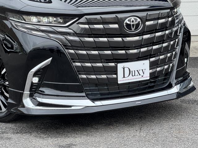 アルファードハイブリッド エグゼクティブラウンジ 内装ニュートラルベージュ 14型コネクトナビ JBLプレミアムサウンド リヤエンターテイメント デジタルミラー 左右独立ムーンルーフ CD/DVDデッキ スペアタイヤ 置くだけ充電 純正19インチAW(18枚目)