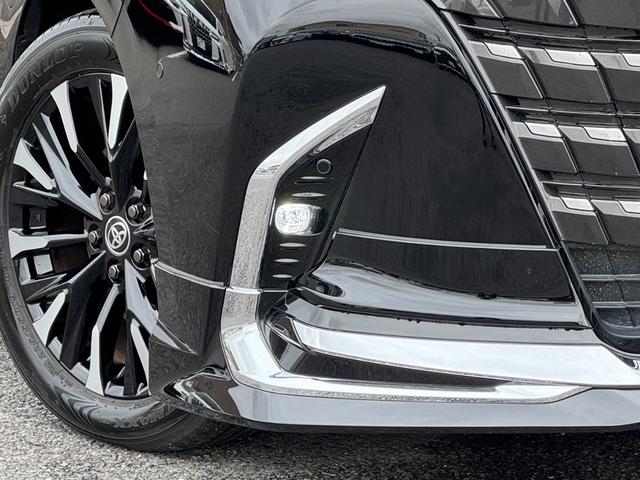 アルファードハイブリッド エグゼクティブラウンジ 内装ニュートラルベージュ 14型コネクトナビ JBLプレミアムサウンド リヤエンターテイメント デジタルミラー 左右独立ムーンルーフ CD/DVDデッキ スペアタイヤ 置くだけ充電 純正19インチAW(21枚目)