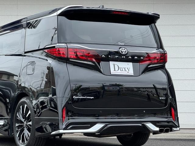 アルファードハイブリッド エグゼクティブラウンジ 内装ニュートラルベージュ 14型コネクトナビ JBLプレミアムサウンド リヤエンターテイメント デジタルミラー 左右独立ムーンルーフ CD/DVDデッキ スペアタイヤ 置くだけ充電 純正19インチAW(27枚目)