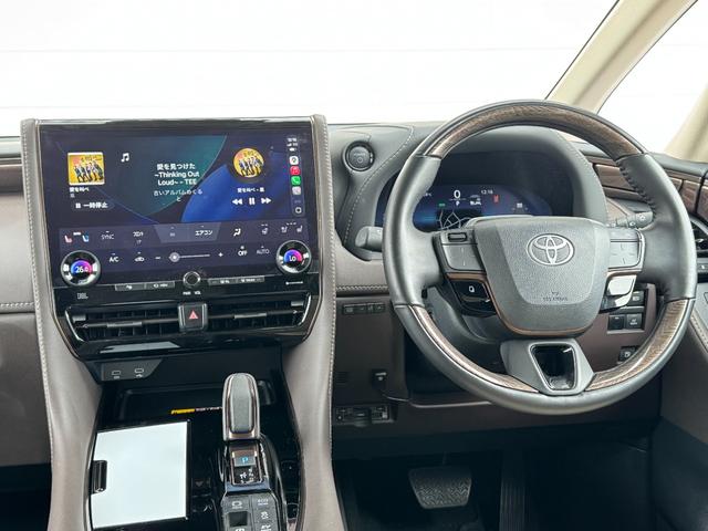 アルファードハイブリッド エグゼクティブラウンジ 内装ニュートラルベージュ 14型コネクトナビ JBLプレミアムサウンド リヤエンターテイメント デジタルミラー 左右独立ムーンルーフ CD/DVDデッキ スペアタイヤ 置くだけ充電 純正19インチAW(37枚目)