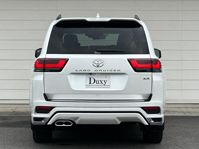 ランドクルーザー ZX モデリスタエアロ+リヤスポイラー 12.3型JBLコネクトナビ リヤエンター クールBOX 電動リヤデフロック 12.3TFTカラーメーター ブラックルーフレール 電動格納式サードシート 純正18AW(5枚目)