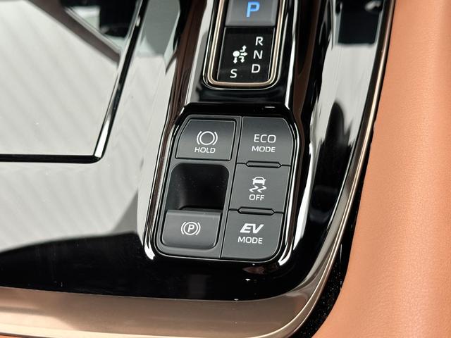 ヴェルファイアハイブリッド Ｚ　プレミア　内装ブラウン　１４型コネクトナビ　左右独立ムーンルーフ　デジタルミラー　トヨタチームメイト　ユニバーサルステップ　シートベンチレーション＆ヒーター　ＢＳＭ　ＨＵＤ　ＡＣ１５００Ｗ　純正１９インチＡＷ（62枚目）