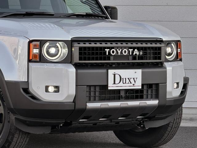 ランドクルーザー２５０ ＺＸファーストエディション　内装ブラウン　丸目ヘッドランプ　１４型コネクトナビ　ＪＢＬプレミアムサウンド　デジタルインナーミラー　アドバンストドライブ　電動格納サードシート　シートメモリ　置くだけ充電　ＡＣ１００Ｖ　純正１８ＡＷ（15枚目）