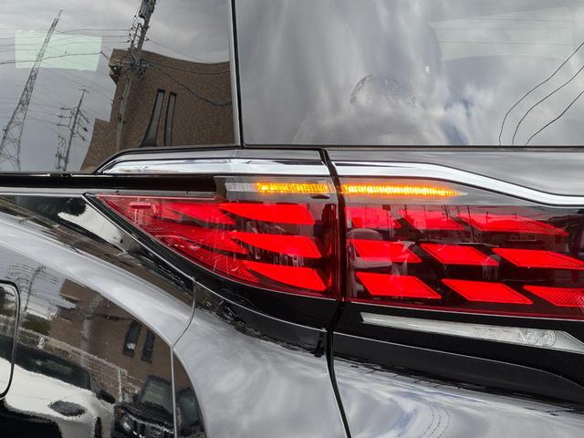 アルファードハイブリッド Z モデリスタエアロ 13.2インチ後席モニター 左右独立ムーンルーフ デジタルミラー アドバンストドライブ&パーク ユニバーサルステップ ヘッドアップディスプレイ 寒冷地仕様 置くだけ充電 純正18AW(28枚目)