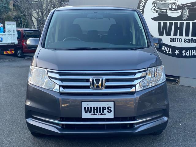 ステップワゴン Ｇ　Ｅセレクション　９インチ純正ナビ　ＢＴ　バックカメラ　後部モニター　ＥＴＣ　クルコン　盗難防止装置　スマートキー　社外アルミホイール　電動格納ミラー　両側スライド片側電動ドア　三列シート　フルフラットシート（13枚目）