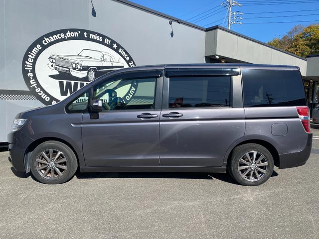 ステップワゴン Ｇ　Ｅセレクション　９インチ純正ナビ　ＢＴ　バックカメラ　後部モニター　ＥＴＣ　クルコン　盗難防止装置　スマートキー　社外アルミホイール　電動格納ミラー　両側スライド片側電動ドア　三列シート　フルフラットシート（19枚目）