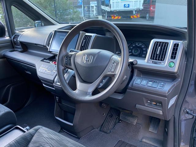 ステップワゴン Ｇ　Ｅセレクション　９インチ純正ナビ　ＢＴ　バックカメラ　後部モニター　ＥＴＣ　クルコン　盗難防止装置　スマートキー　社外アルミホイール　電動格納ミラー　両側スライド片側電動ドア　三列シート　フルフラットシート（36枚目）