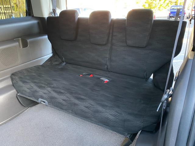 ステップワゴン Ｇ　Ｅセレクション　９インチ純正ナビ　ＢＴ　バックカメラ　後部モニター　ＥＴＣ　クルコン　盗難防止装置　スマートキー　社外アルミホイール　電動格納ミラー　両側スライド片側電動ドア　三列シート　フルフラットシート（50枚目）